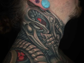 bio-organic-alien-neck-tattoo-terry-ribera-san-diego