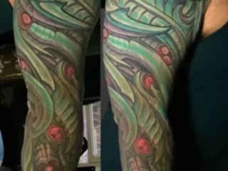 bio-organic-green-red-full-sleeve-tattoo-terry-ribera-san-diego