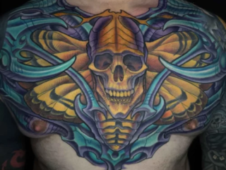 bio-organic-skull-moth-wings-chest-piece-tattoo-terry-ribera-san-diego