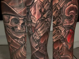 illustrative-black-grey-outlaw-cowboy-skull-guns-sleeve-tattoo-terry-ribera-san-diego
