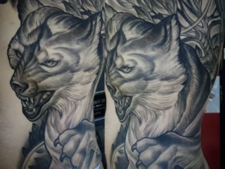 illustrative-black-grey-werewolf-ribs-tattoo-terry-ribera-san-diego