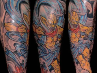 illustrative-neo-japanese-gold-demon-blue-waves-maple-leaves-calf-tattoo-terry-ribera-san-diego