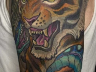 illustrative-neo-japanese-tiger-shoulder-upper-arm-tattoo-terry-ribera-san-diego
