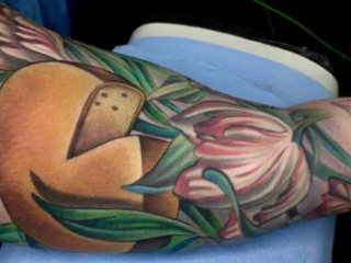 illustrative-neo-traditional-mushroom-tulip-forearm-tattoo-terry-ribera-san-diego