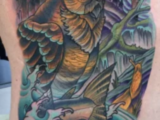 illustrative-neo-traditional-owl-fish-mountain-rib-tattoo-terry-ribera-san-diego