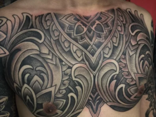ornamental-mandala-chest-piece-black-grey-tattoo-terry-ribera-san-diego